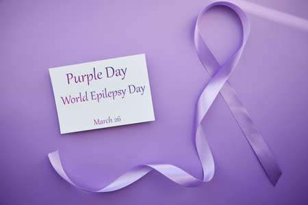 Purple Day - World Epilepsy Day, March of 26. Symbol of Epilepsy Day. ribbon and text.の写真素材