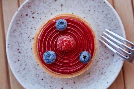 Wireless earphones on notepad mock up and laptop. Freelance, remote work, taking webinar, calling to family concept. New year's goals and resolutions mock up. Christmas, New Year's present conceptの写真素材