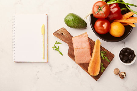 Fodmap, Mediterranean diet concept with mockup notepad copy space. Healthy low fodmap ingredients -...
