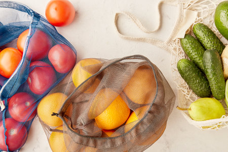 Reusable eco friendlyl bags with fruits and vegetables groceries. Zero waste, sustainable lifestyle....