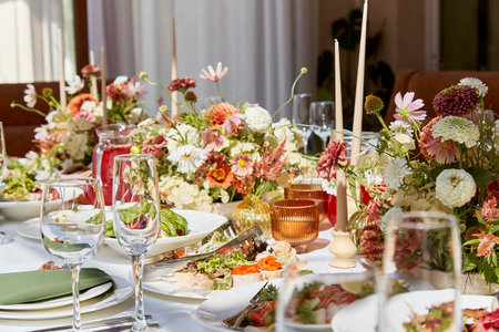 Aesthetics table setting with candles and flowers design. Restaurant chamber event in provence...