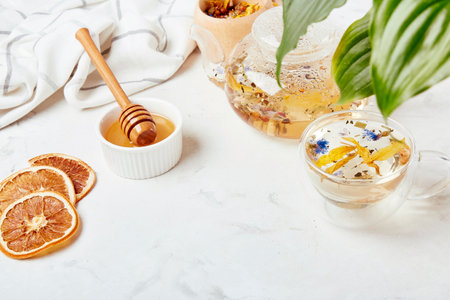 mountain herbal tranquility - therapeutic tea table setting.の写真素材