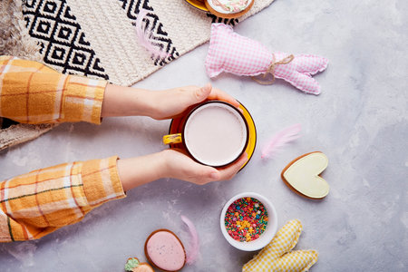 Tasty Easter traditions. Easter vibes for kids. Happy Easter. Sweet cocoa and cookies.