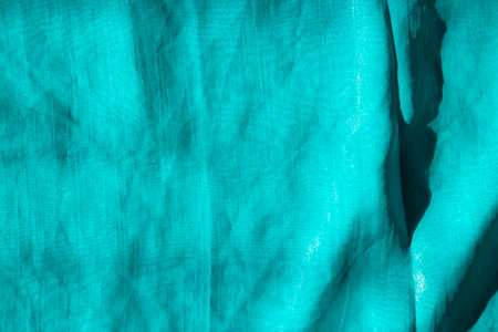 Serene Teal Waves - Textured Fabric Detail background.の写真素材