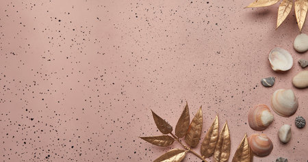 Elegant summer background with golden foliage and shells, copy space. Extra wide banner.の写真素材