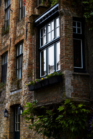 Authentic Bruges Architecture with Wooden and Stone Elements.