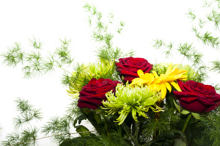 Close- up of a bouquet of roses , chrysanthemums and branches asparagusの写真素材