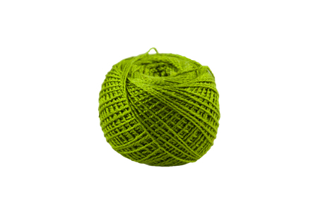 ball of green color of cotton threads for knitting on a white backgroundの写真素材