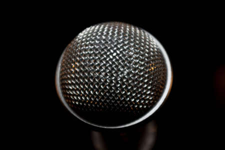 macro of a microphone on black backgroundの写真素材
