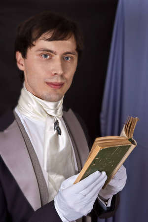 portrait of dandy with book