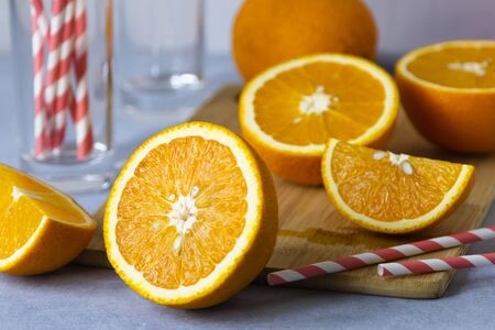 Freshly half fruits of orange for juice home. Organic oranges. Healthy foodの写真素材