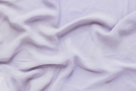 Texture of silk fabric, soft pastel purple. Beautiful soft crumpled silk texture.の写真素材