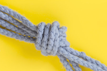 Rope knot. Concept for trust, faith, strength or stress. Selective focus. Trend color of the year...
