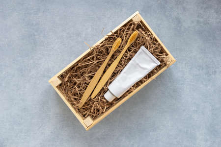 Preparing gift box set of natural eco friendly supplies for teeth. Crafting homemade gift basket. Zero waste.の写真素材