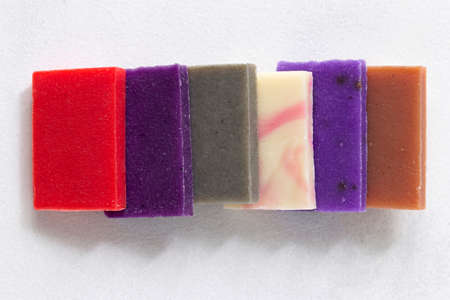 Variety of natural organic handcraft soap bars on white background.の写真素材