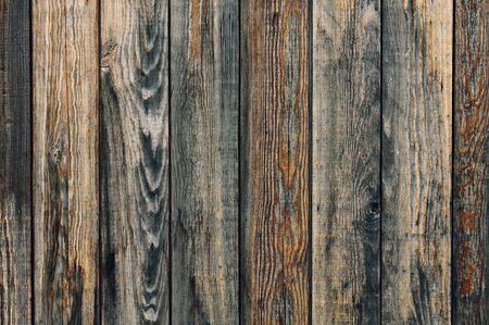 Old wooden fencesold fence planks as backgroundの写真素材