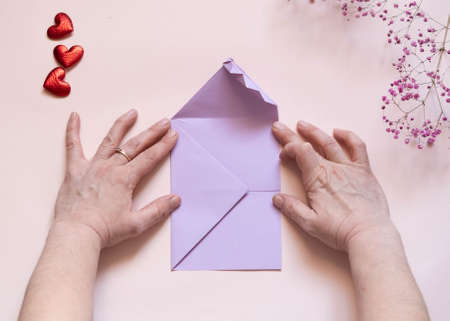 DIY concept. Step 12. Step-by-step photo instructions. A postcard with a flower for Valentine's Dayの写真素材