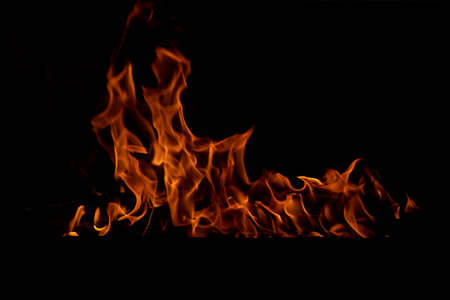 The texture of the fire is close, red and yellow, thermal energy at the fuel supply point at night,...