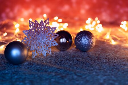 New Years abstraction in the form of multi-colored bokeh on a blue background. Festive mood.の写真素材