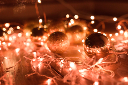 Christmas balls with a garland of coral color.の写真素材