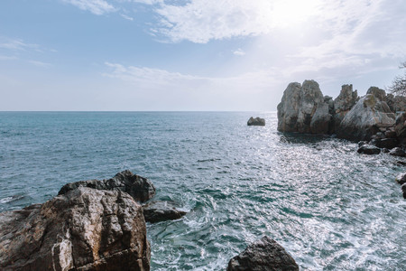 Scenic view of the coast, the scenery of the beautiful beach. Summer sunny day.