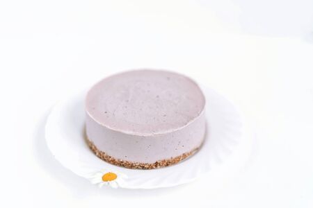 Airy vegan pie in the shape of a circle. Isolated on a white background. Vegan dessert.の写真素材