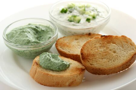 Cucumber and spinach dips with bread