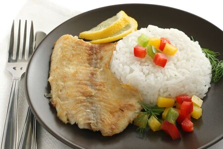 fried tilapia with riceの写真素材