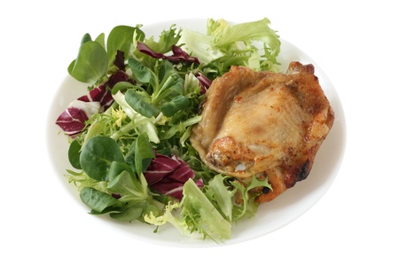 fried chicken with salad on a plateの写真素材