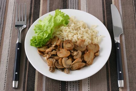 mushrooms with boiled riceの写真素材