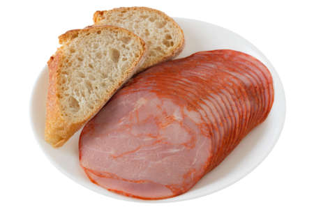 ham with bread on the plateの写真素材
