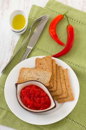 pepper sauce with toasts on the plateの写真素材