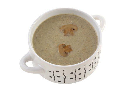 mushroom soup in the bowl on white backgroundの写真素材