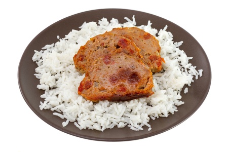 meat with boiled rice on brown plateの写真素材