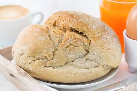 bread with coffee, juice and egg