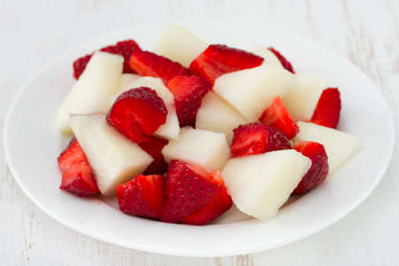 fruit salad on the plateの写真素材