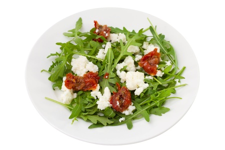 rucola with dry tomato and cheeseの写真素材