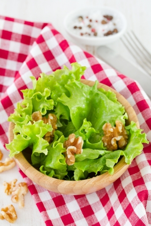 salad with walnut in bowlの写真素材