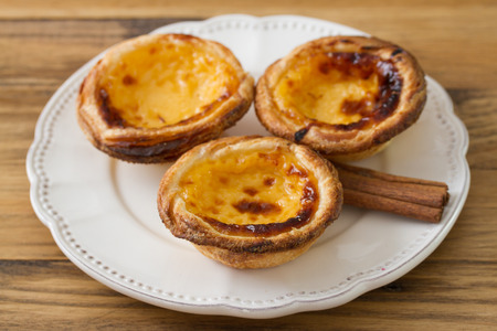 portuguese cookies with cinnamon on white dish