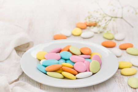 candies on white plateの写真素材