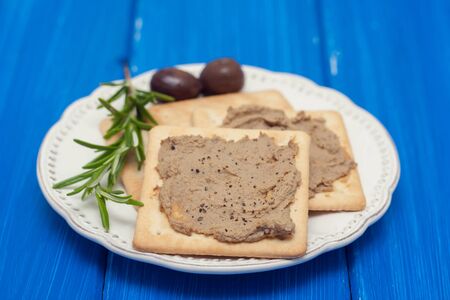 Crackers with pate in dishの写真素材