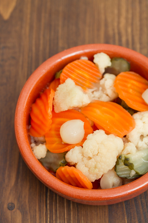 pickles in ceramic dishの写真素材