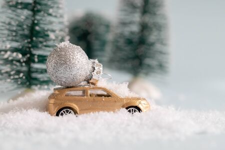 Christmas car with toy and snowの写真素材