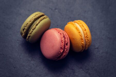 delicious colorful macaroons on ceramic backgroundの写真素材