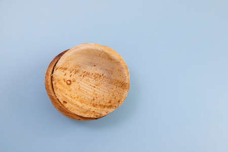 natural dishes on blue paper backgroundの写真素材