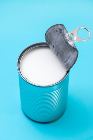 coconut milk in an iron canの写真素材