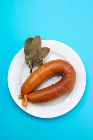 typical portuguese smoked sausage Farinheira on the dishの写真素材