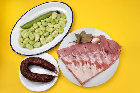 ingredients for portuguese dish green beans, smoked sausage and meatの写真素材