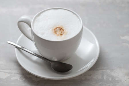 cup of coffee with milk with strong foam on ceramicの写真素材