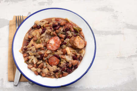 typical portuguese meat and sausages stew in dish on ceramicの写真素材